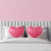 bed soft pillows headboard love hearts pink white sheets furniture sleep relax couple cuddle frame mattress quilt duvet bedding shape. Sweet valentine festival marriage and sex. 3D Illustration.